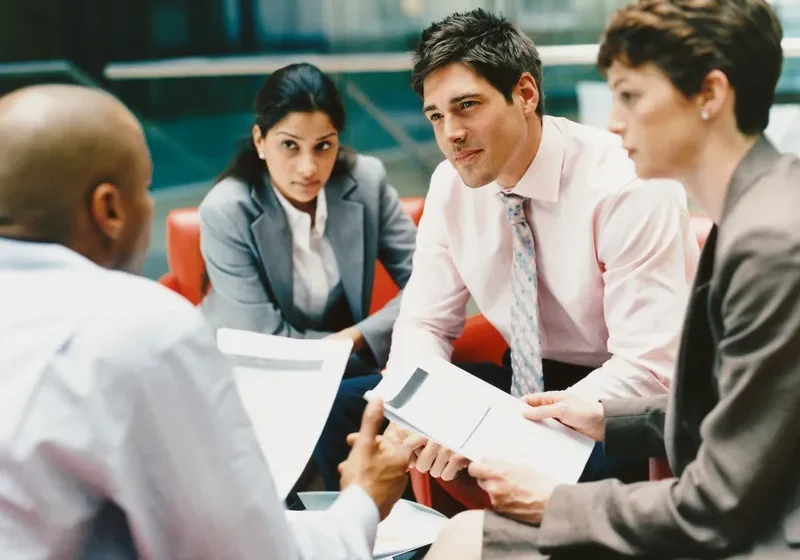 Business meeting with four professionals