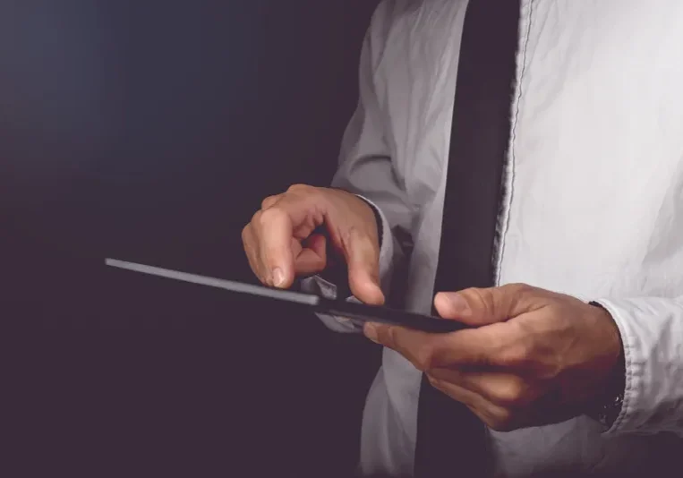 Man using a tablet device