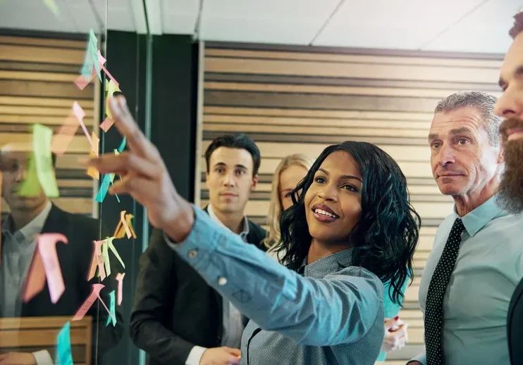 Diverse professionals brainstorming together