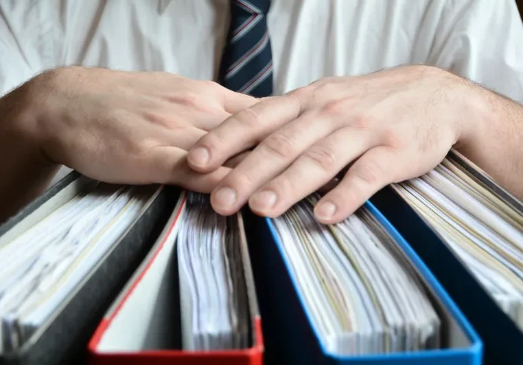 Businessman organizing documents