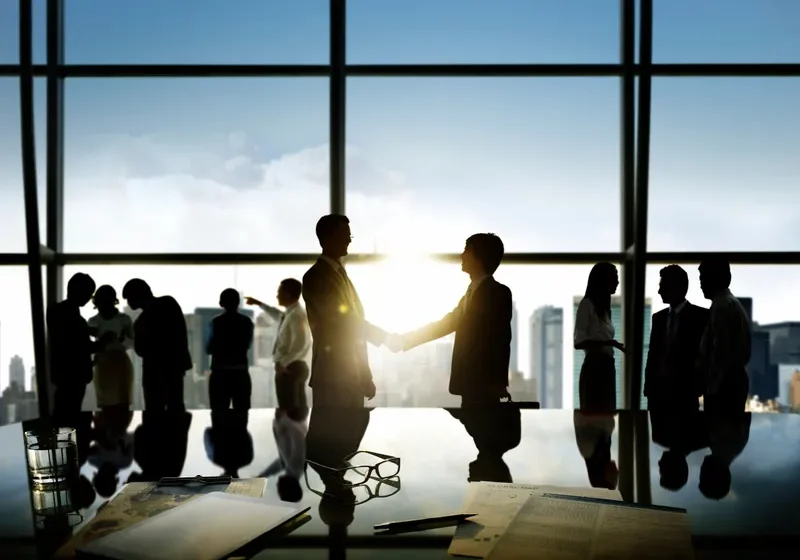 Professionals discussing in conference room